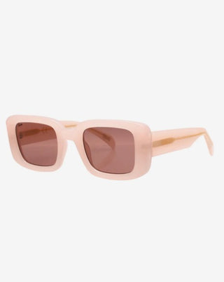 Pink sunglasses with brown lenses on a white background