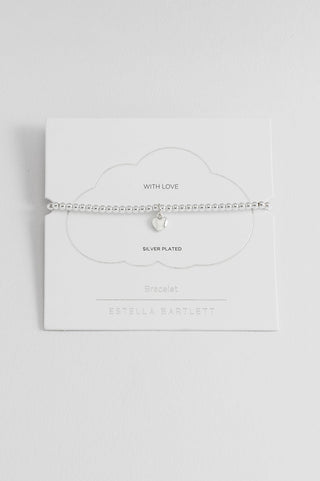 Silver necklace on a white card with 'WITH LOVE' text