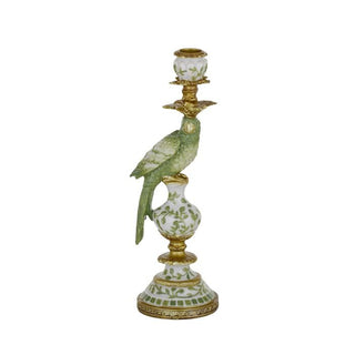 Decorative candle holder with a parrot design on a white background