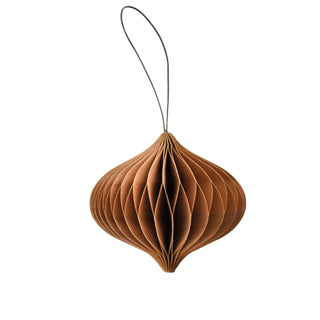 Brown paper ornament with string on a white background