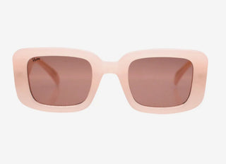 Pink sunglasses with brown lenses on a white background