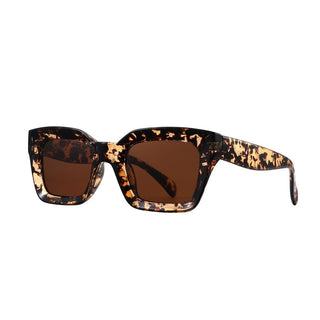Sunglasses with tortoiseshell frame and brown lenses on a white background