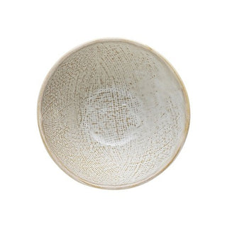 Textured ceramic bowl on a white background