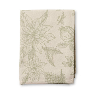 Fabric with green leaf pattern on a beige background