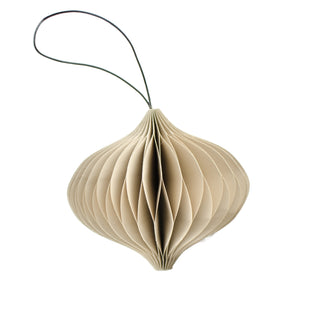 Beige paper lantern hanging from a string on a white background
