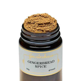 Jar of gingerbread spice with a white label on a white background