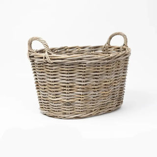 Woven basket with handles on a white background