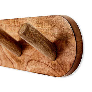 Wooden cutting board with two handles on a white background