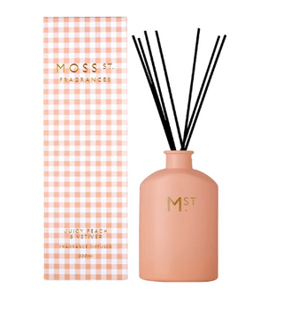 Moss St. Juicy Peach & Vetiver diffuser with packaging on a white background
