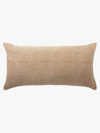 Beige pillow on a white background