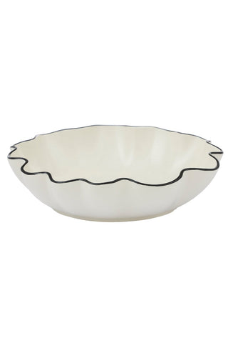 White ceramic bowl with black rim on a white background