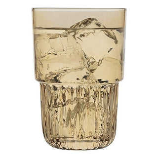 Clear glass with water and ice cubes on a white background