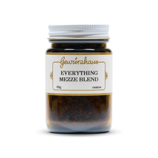 Jar of 'Everything Mezze Blend' with a white label on a white background