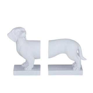 White dog-shaped bookends on a white background