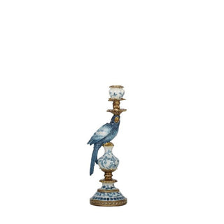 Decorative candle holder with a bird design on a white background