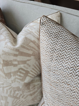 Close-up of patterned pillows on a sofa