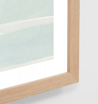 Close-up of a wooden frame with glass on a white background