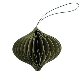 Green jewel ornament with a string on a white background