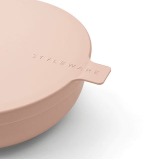 Pink dish with 'STYLEWARE' branding on a white background