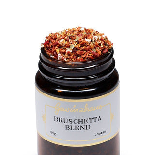 Jar of 'Bruschetta Blend' spice mix on a white background