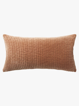 Brown textured pillow on a white background