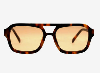 Sunglasses with tortoiseshell frame and reflective lenses on a white background