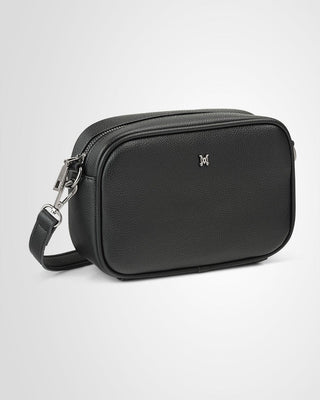 Black leather crossbody bag on a light gray background
