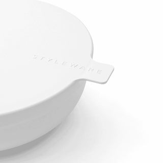 White ceramic bowl with 'Little Wake' branding on a light gray background