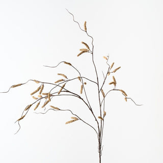 Artificial plant branch with dried flowers on a white background