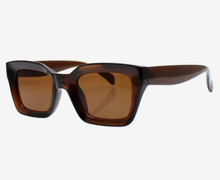 Brown sunglasses with a white background
