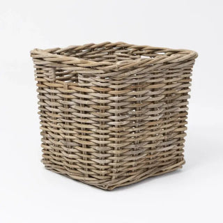 Woven rattan cube basket on a white background
