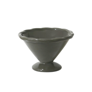 Green ceramic bowl on a white background