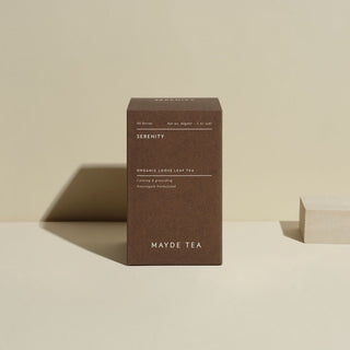 Mayde Tea box labeled 'Adapt' on a beige background