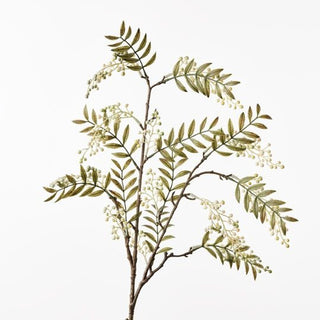 Artificial plant branch with green leaves and small white flowers on a light gray background
