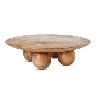 Wooden coffee table with round top and spherical legs on a white background