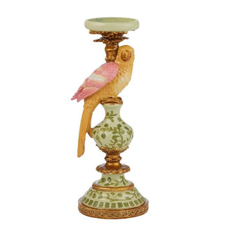 Decorative candle holder with a parrot design on a white background